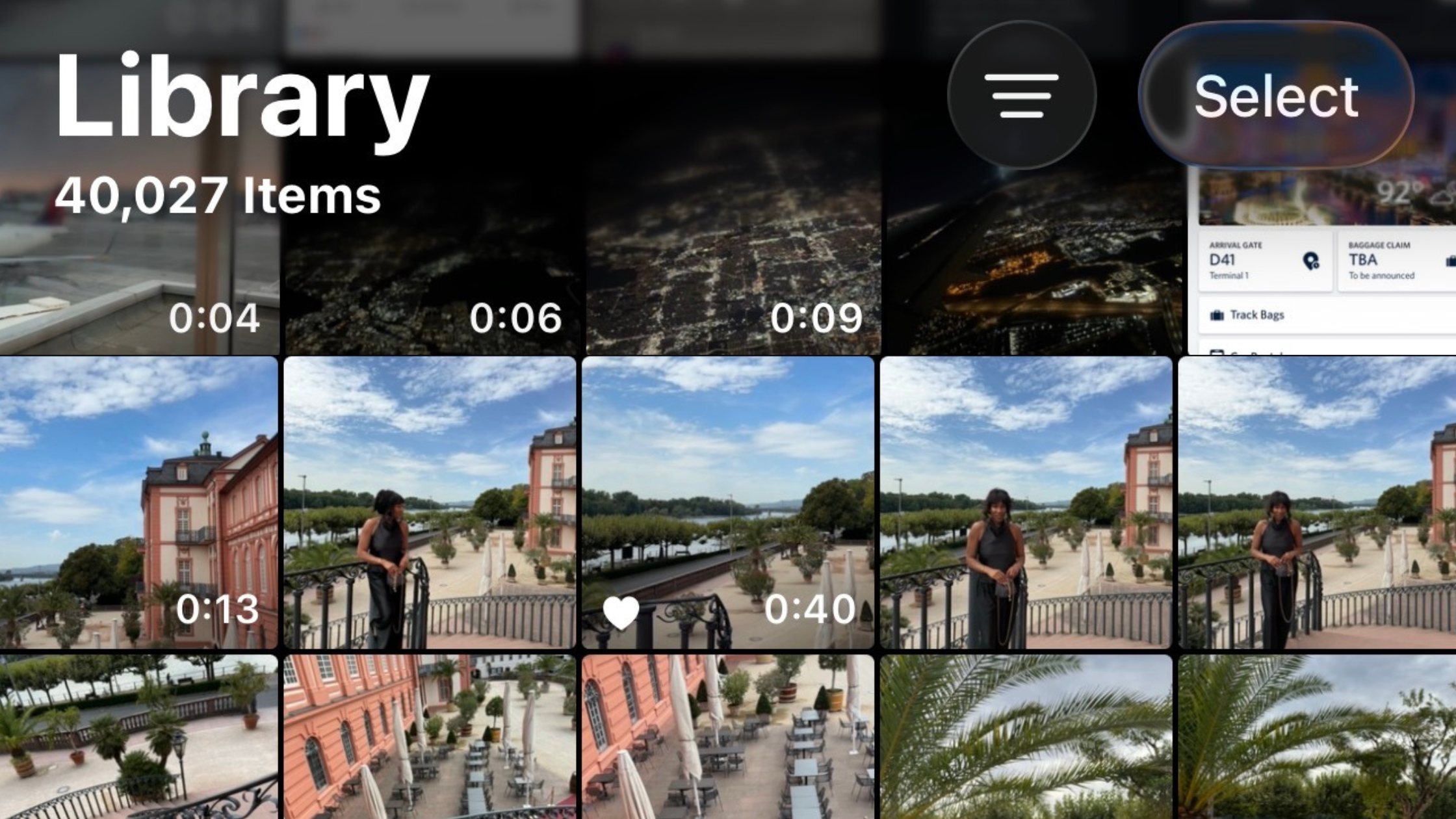 Picture of Camera Roll the first line shows views from an airplane the second and third row shows multiple similar pictures of Jodi posing around Germany wearing a black silk matching set in front of a palace. There are photo and video clips. 